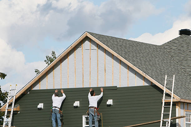 Professional Emergency Siding Repair technician working in Elberon, VA